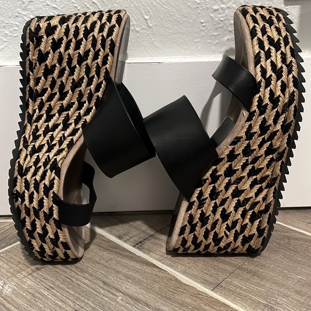 Gently used black leather Pedro Garcia espadrille wedges. Made in Spain.